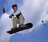 Snowboarder carving a turn